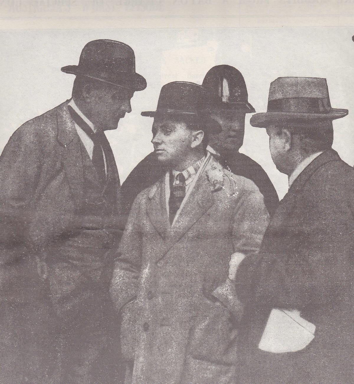 Squizzy Taylor surrendering to police, September 1922. Image: The Sun, Melbourne, 22 September 1922. Public domain in Australia.
