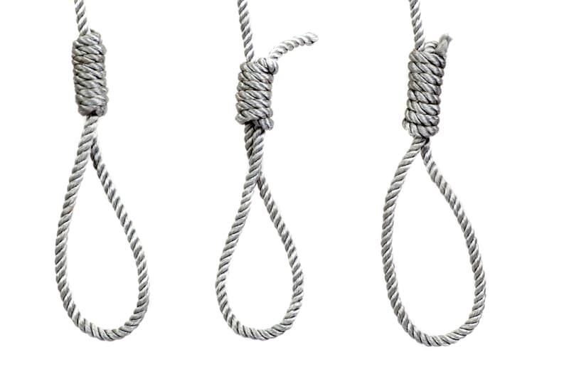 Three hanging noose ropes isolated on a white background