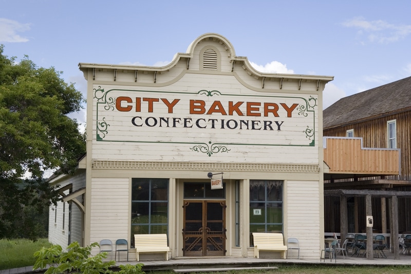 Vintage bakery storefront on a sunny day "She Was Always Kind and Good to Me": Employee Hanged at Melbourne Gaol for Murdering His Employer